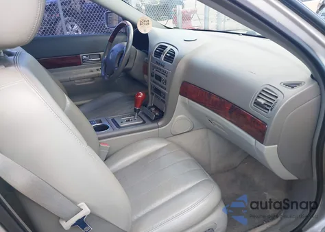 2003 Lincoln Ls V8 z USA, uszkodzony, nr VIN 1LNHM87A13Y659341